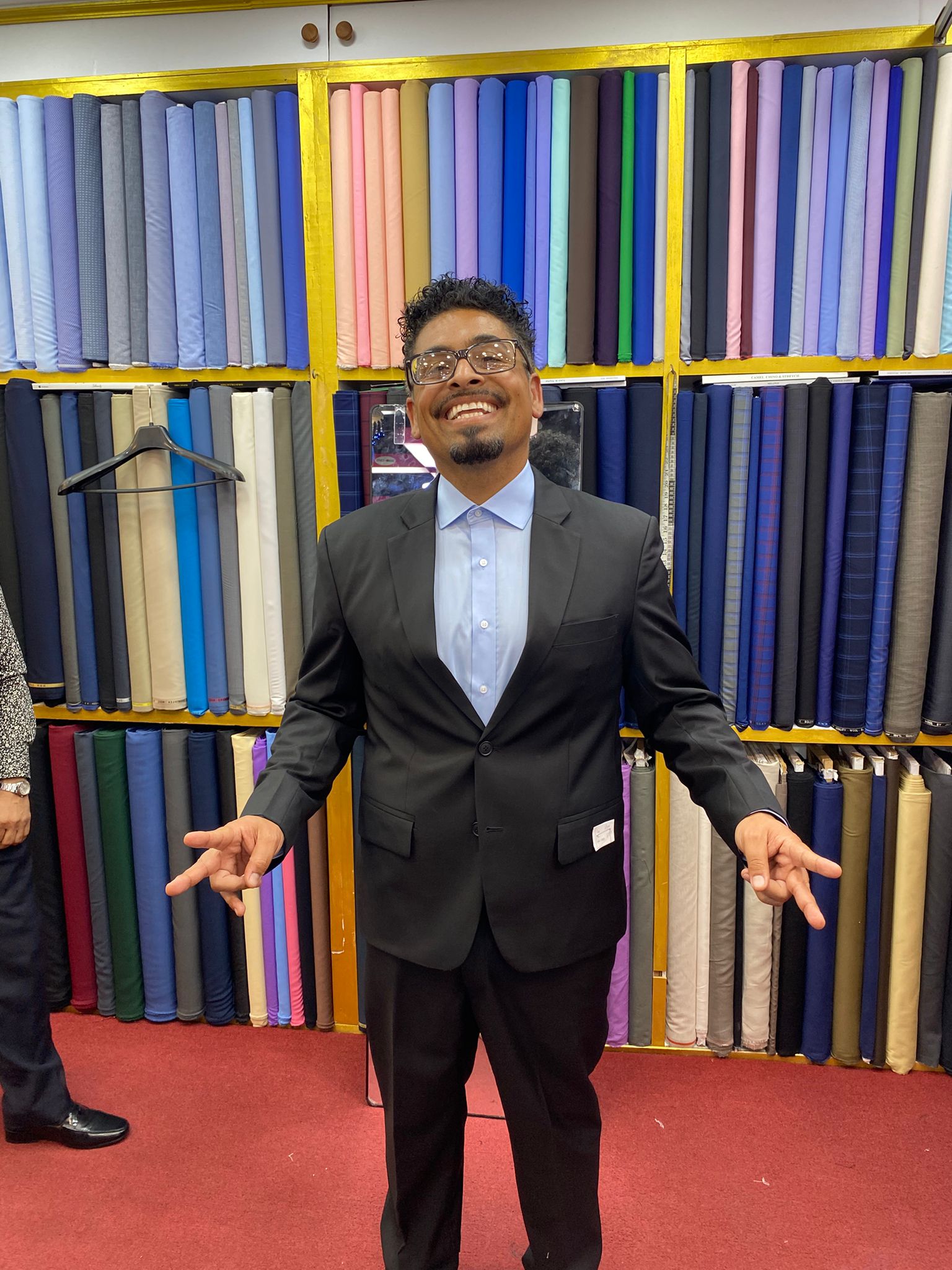 Happy client in custom tailored suit at King Fashion Uni Bangkok